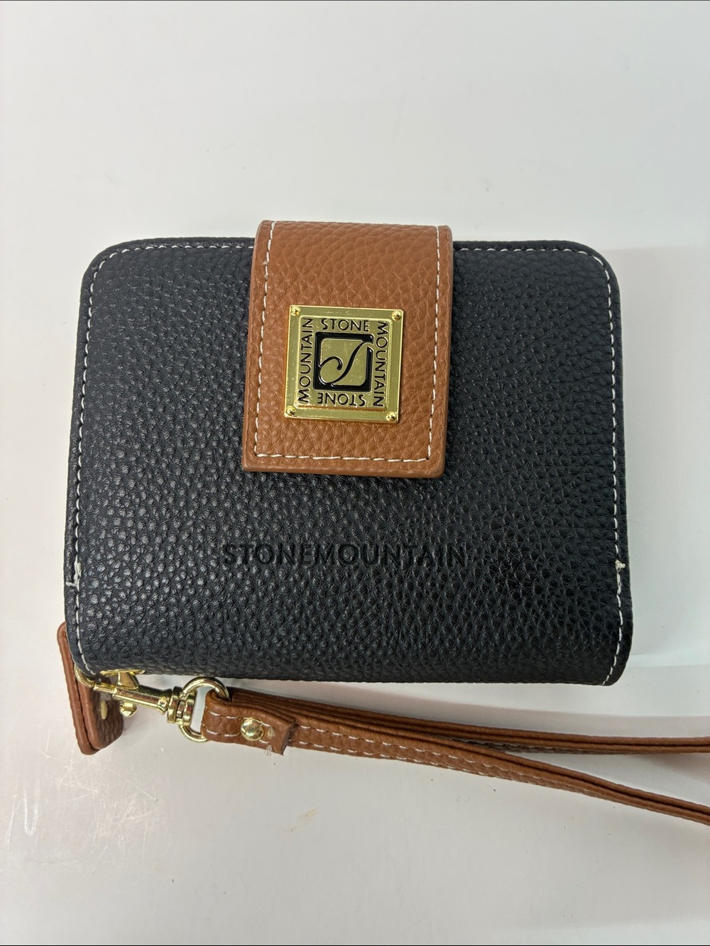 Stone Mountain Black and Brown Pebbled Leather Wristlet